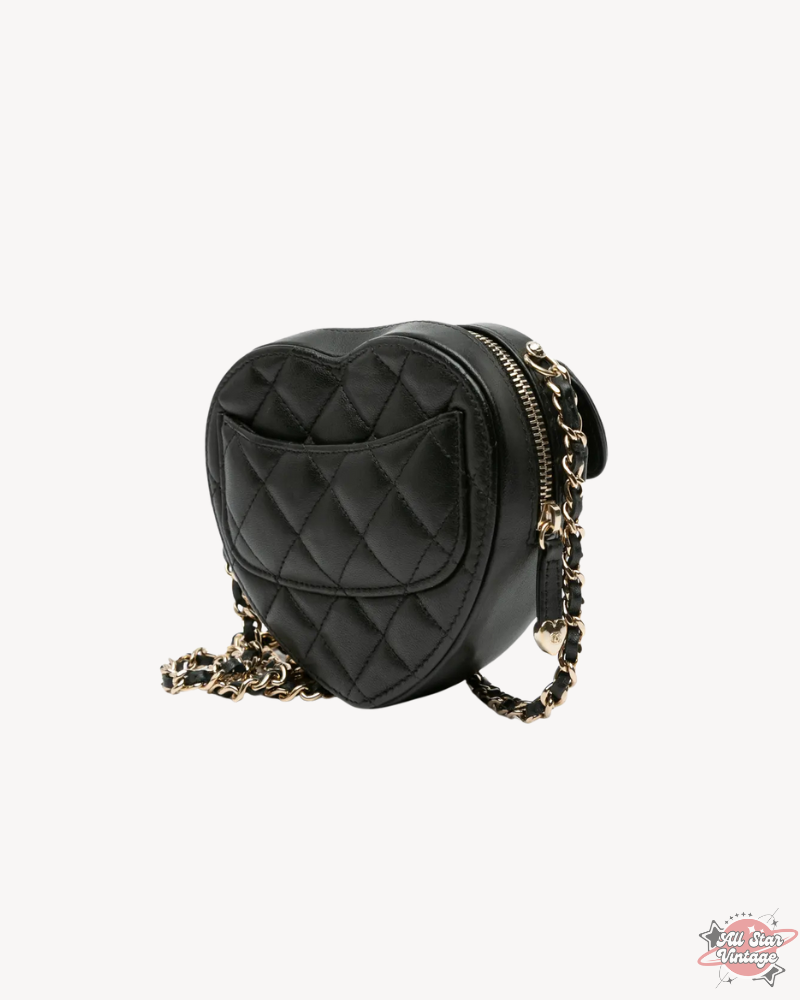 Back view of the Chanel Mini CC In Love Heart Crossbody featuring the quilted leather and a convenient slip pocket