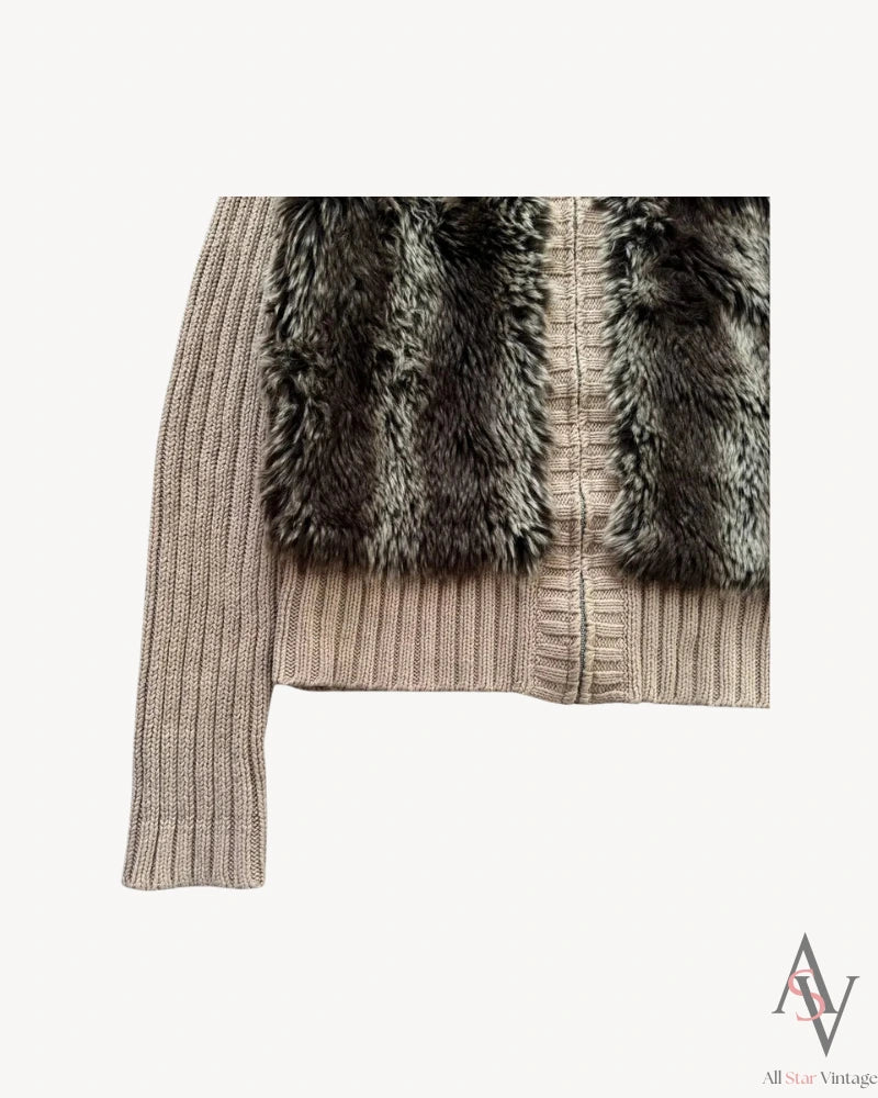 Detailed close-up of the sleeve and faux fur panel of the taupe ribbed knit cardigan, emphasizing the soft, cozy knit fabric and contrasting textures.