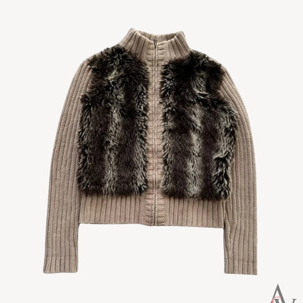 Front view of a taupe ribbed knit cardigan featuring a plush faux fur panel on the front, a high collar, and a zip-up closure for a chic and cozy look