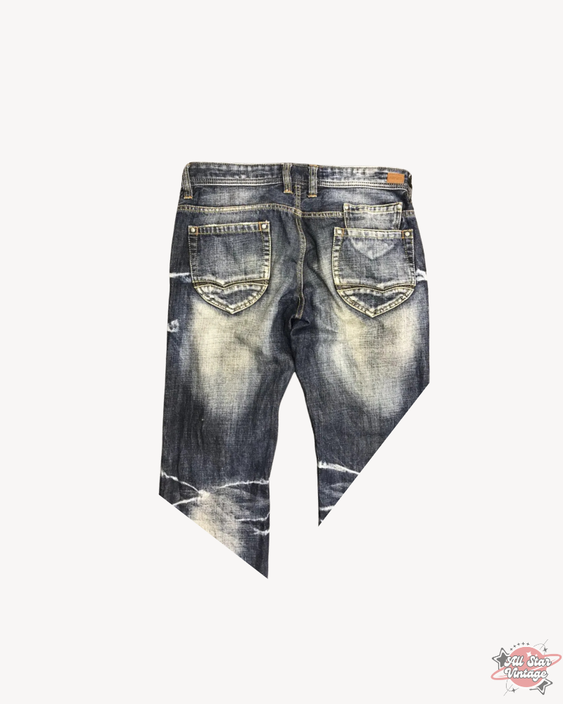 Vintage Flare NCFM Japan Distressed Faded Jeans showing a unique worn-in design with explosive distressing and premium craftsmanship, perfect for streetwear lovers.