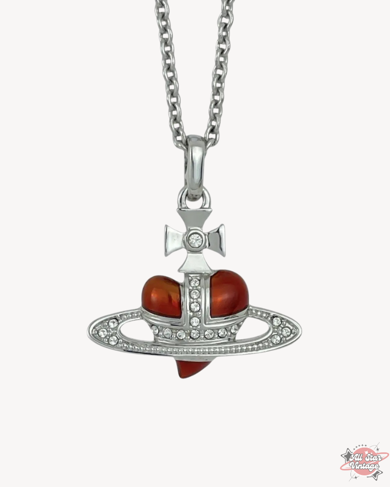 Vivienne Westwood Crystal Heart Orb Necklace featuring a red heart and silver orb design with embedded crystals. A timeless luxury accessory for romantic and elegant styles.