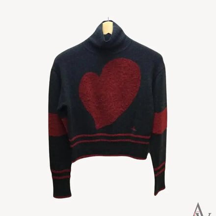 Front view of a Vivienne Westwood Red Label knit sweater, featuring a bold red heart intarsia design on a navy background with red striped details