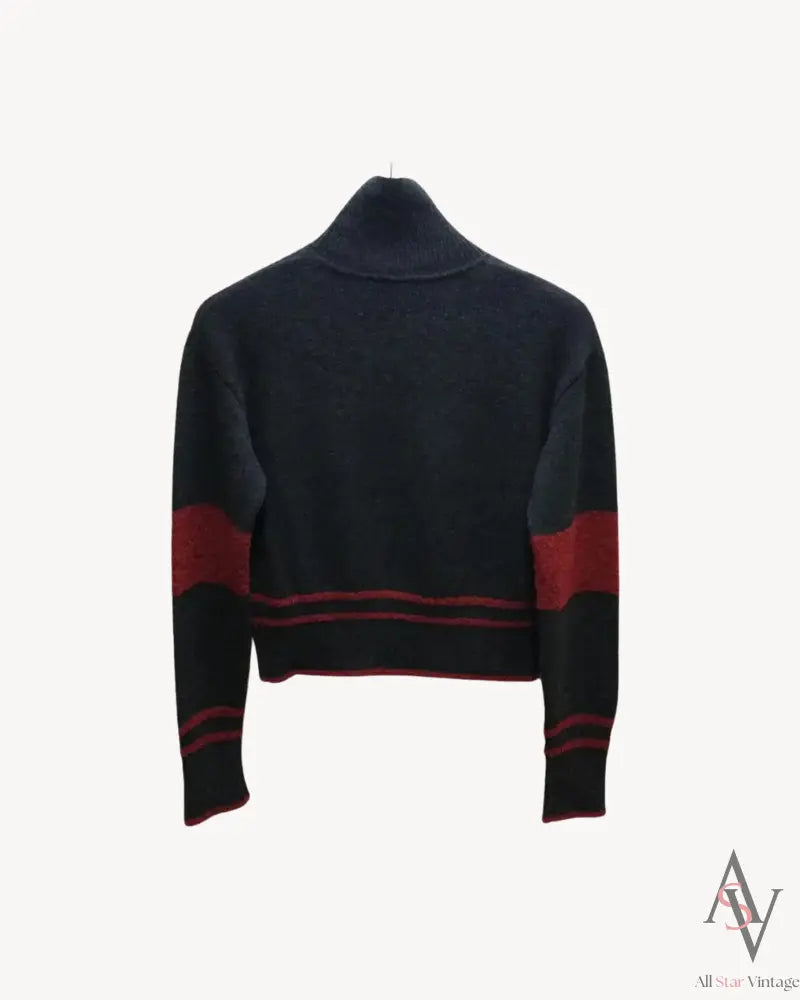 vivienne-westwood-red-label-striped-knit-sweater-back-view
Alt Text: Back view of a Vivienne Westwood Red Label knit sweater, featuring a navy base with red stripe details across the sleeves and waist.